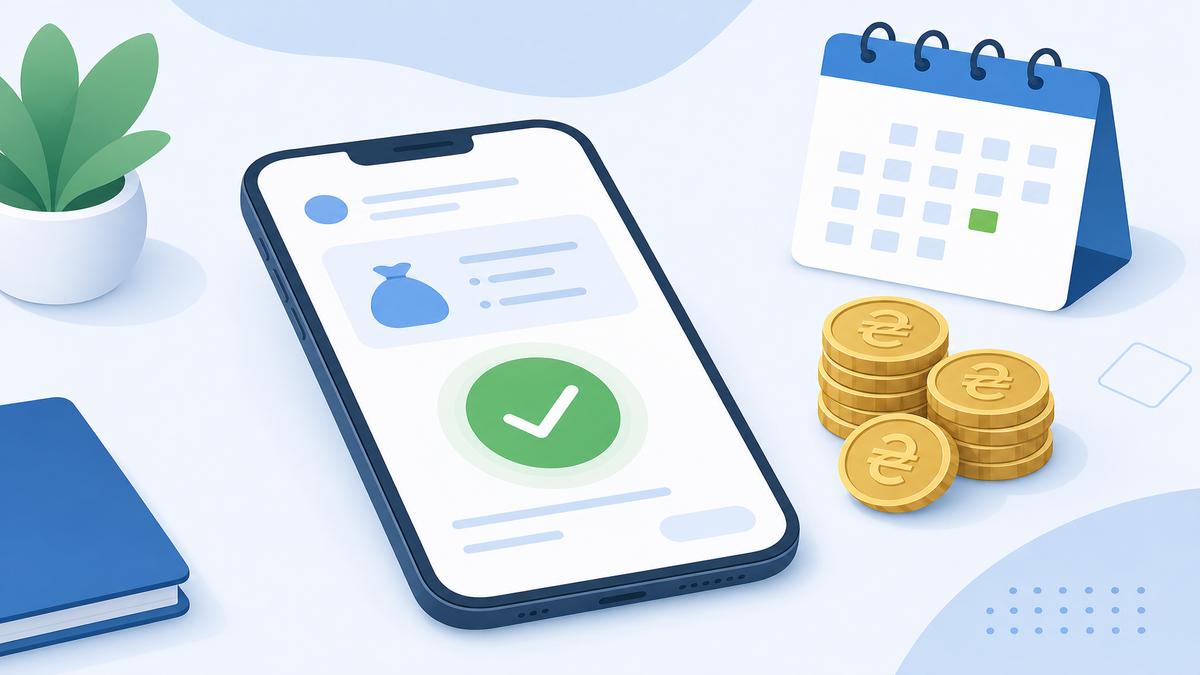 Смартфон із підтвердженням платежу та монети поряд